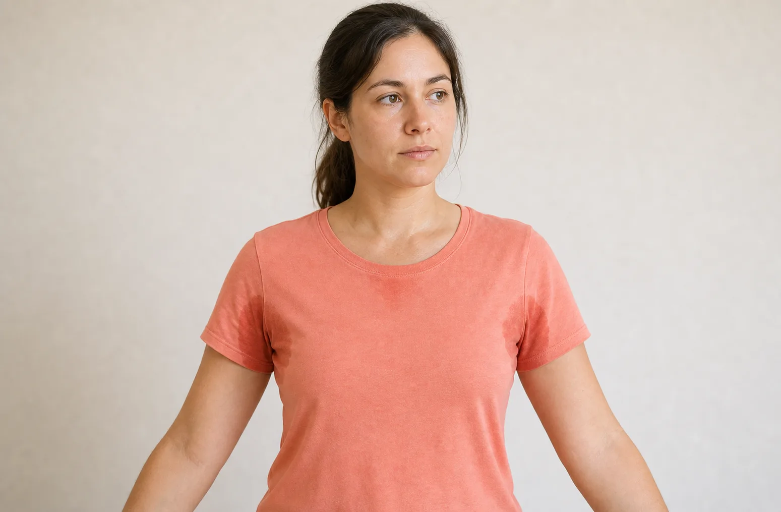 01 female hyperhidrosis coral tshirt underarms educational reference for Hyperhidrosis vs Antiperspirant