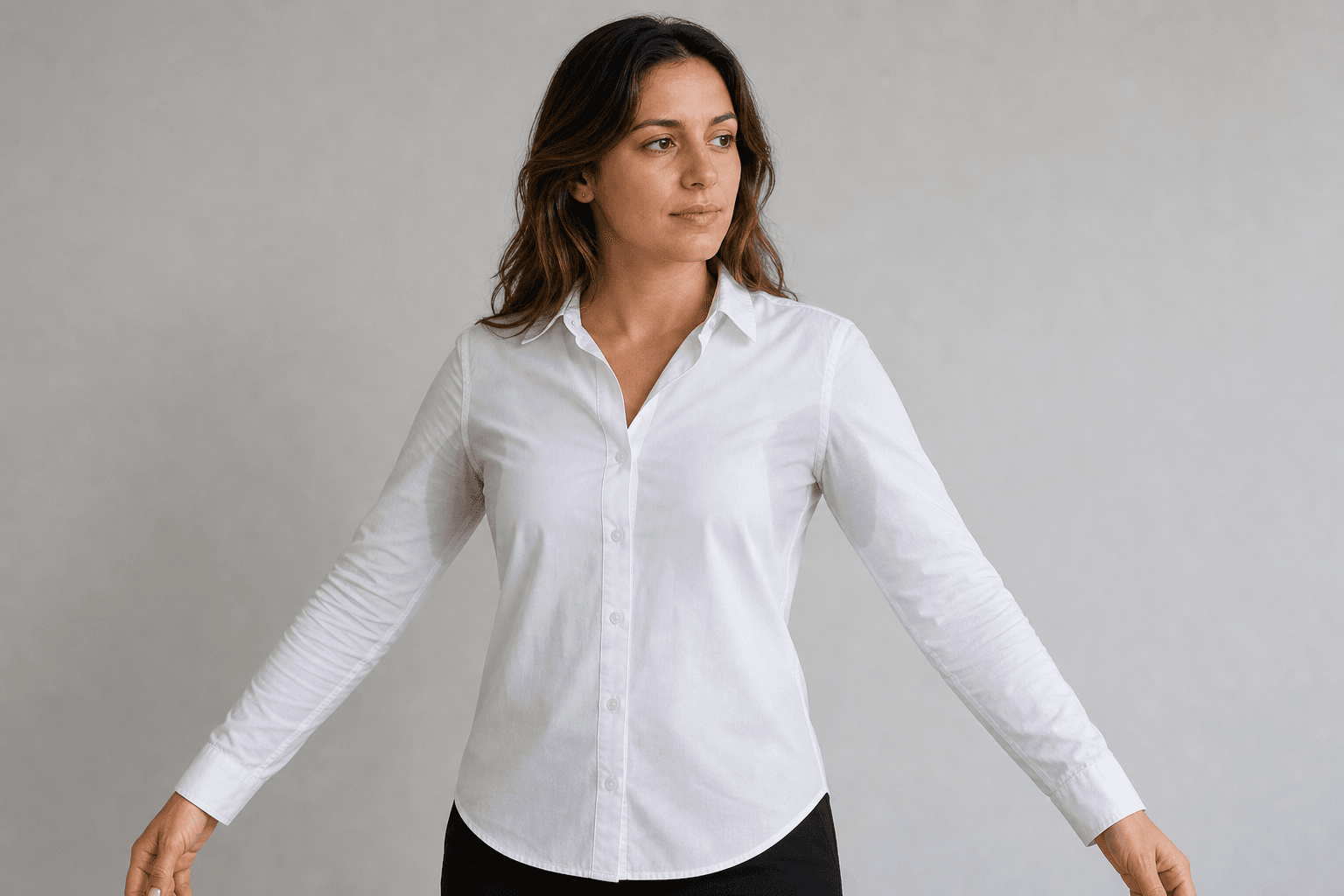 Adult woman preparing to discuss underarm sweating at a private consultation