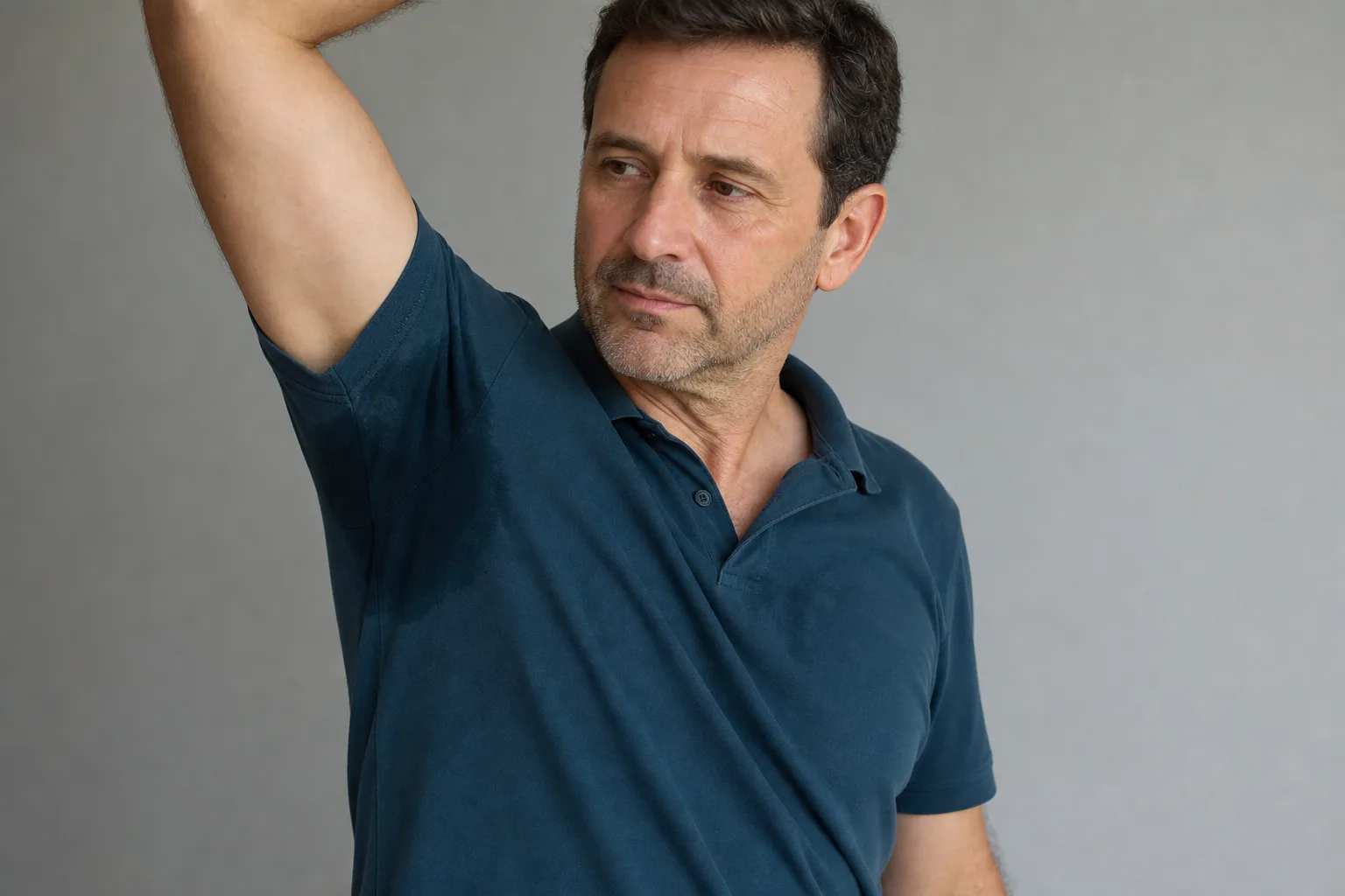 Core Aesthetics 07 male hyperhidrosis teal polo underarms