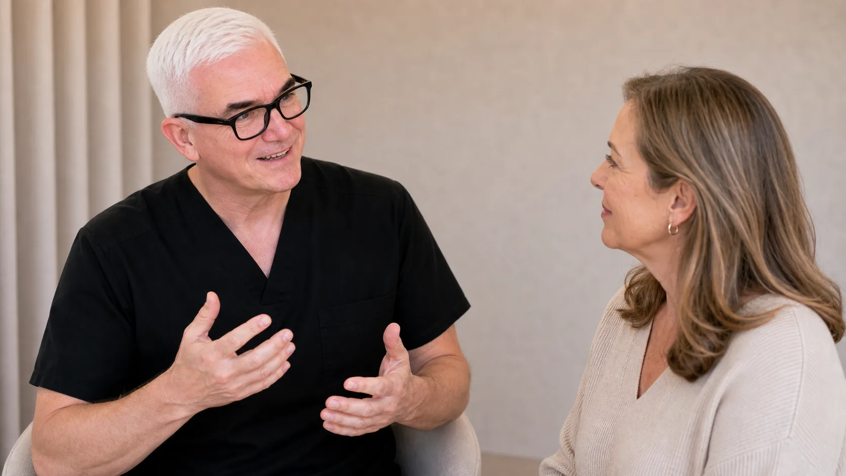 Corey Anderson RN in a genuine cheek and midface consultation discussion with an adult staff model