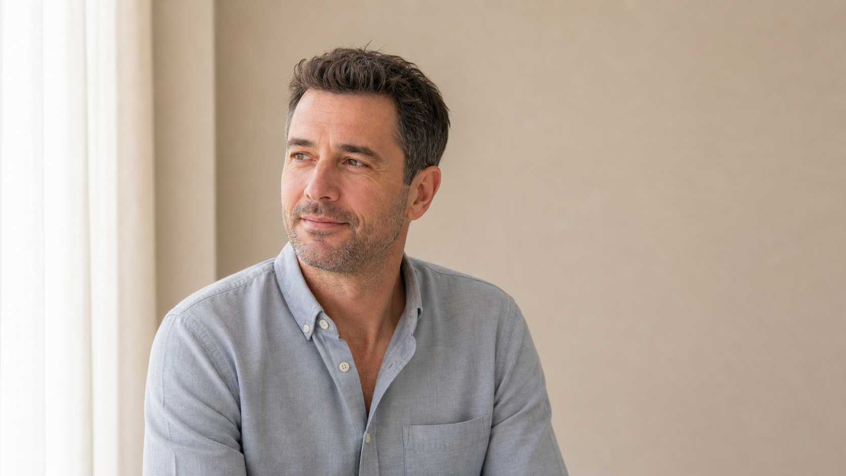 Adult man in a wider portrait used for male lip consultation context
