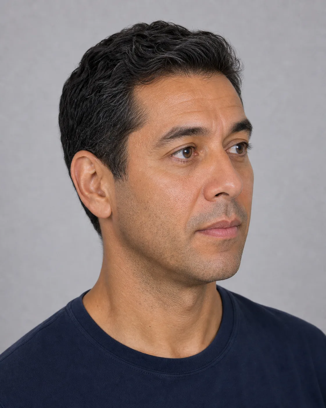 Three quarter portrait of an adult man showing the lips in natural lower face context