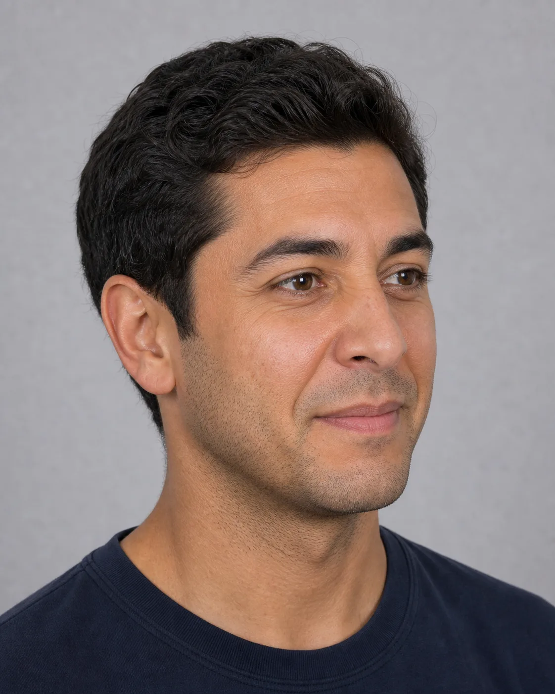 Adult man shown in three-quarter view for a general facial assessment conversation