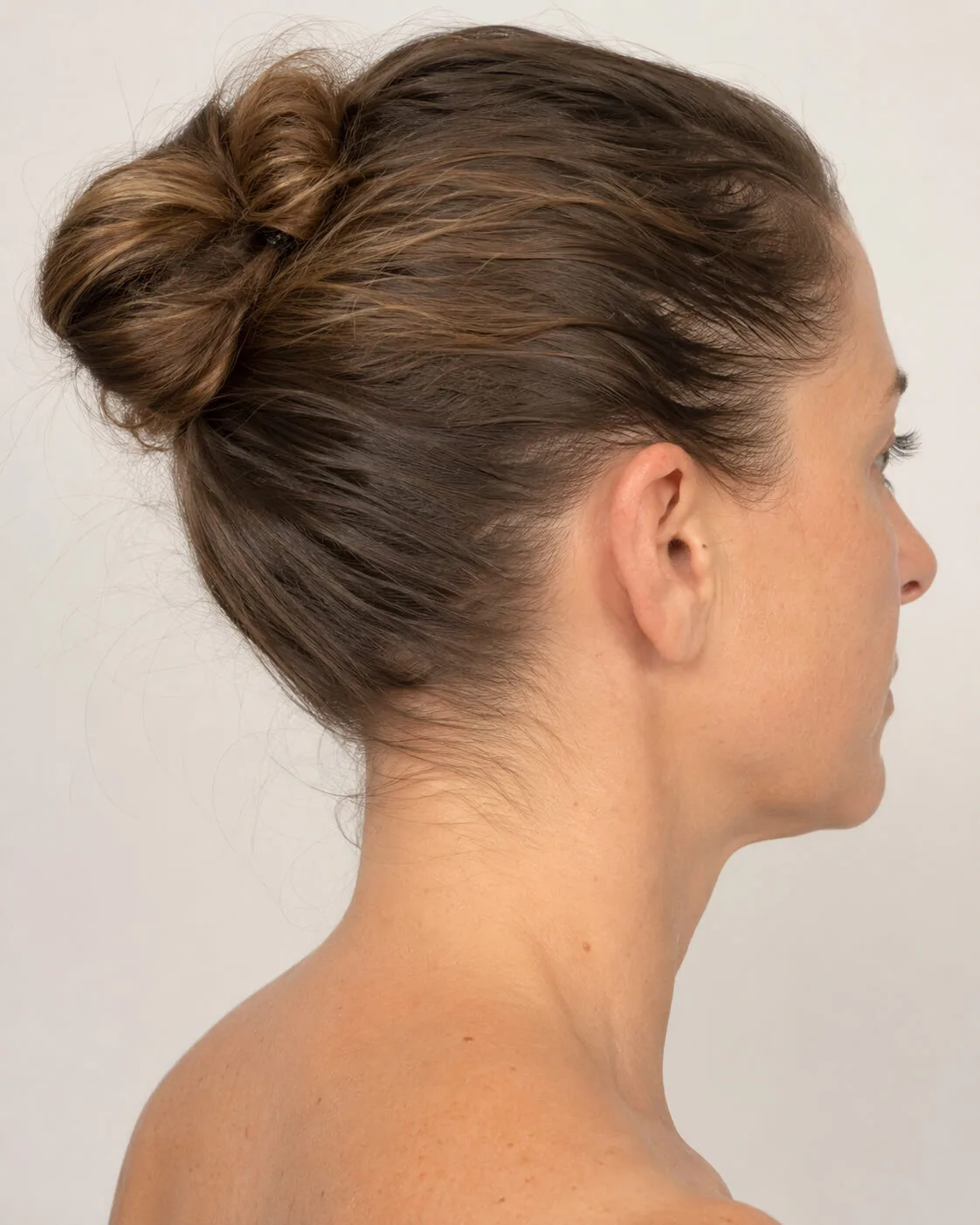 Adult patient pausing during a private cosmetic consultation conversation