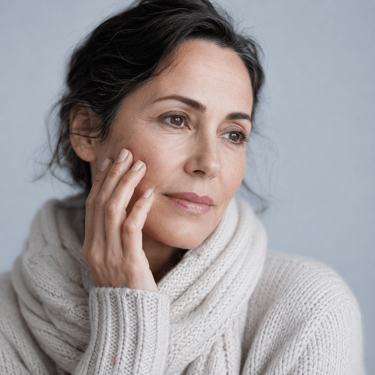 Adult patient discussing facial balance and support during a consultation at Core Aesthetics