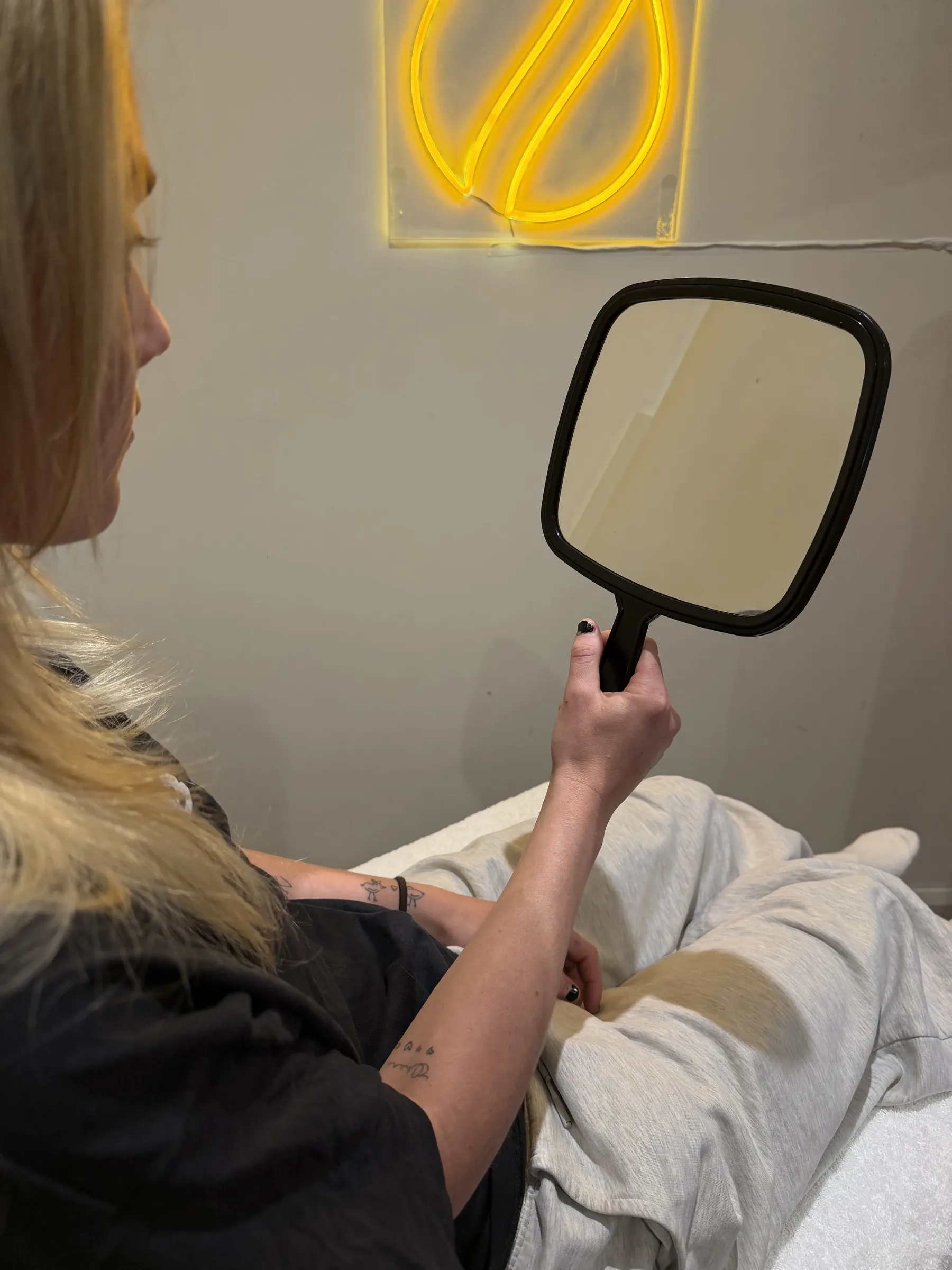 Mirror review for previous cosmetic treatment concern consultation at Core Aesthetics Oakleigh