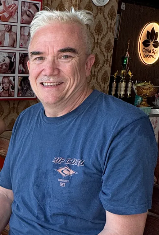 Corey Anderson RN seated portrait for identity and Ahpra registration verification