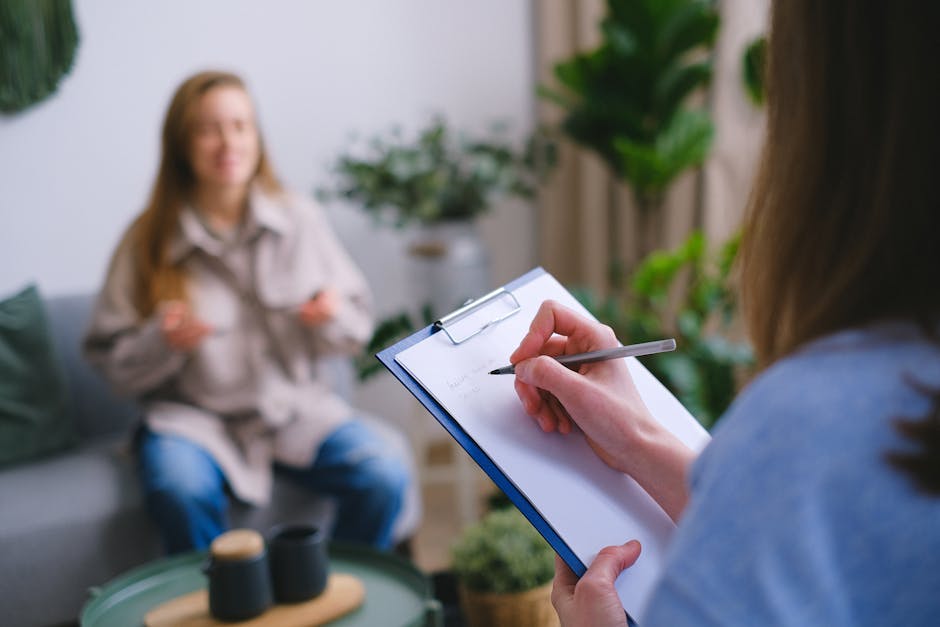 Private planning and written notes in a calm consultation setting.
