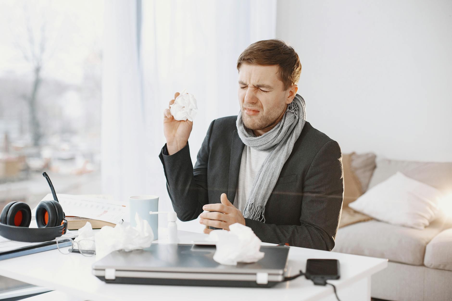 Man following a personal grooming routine in a bathroom setting.