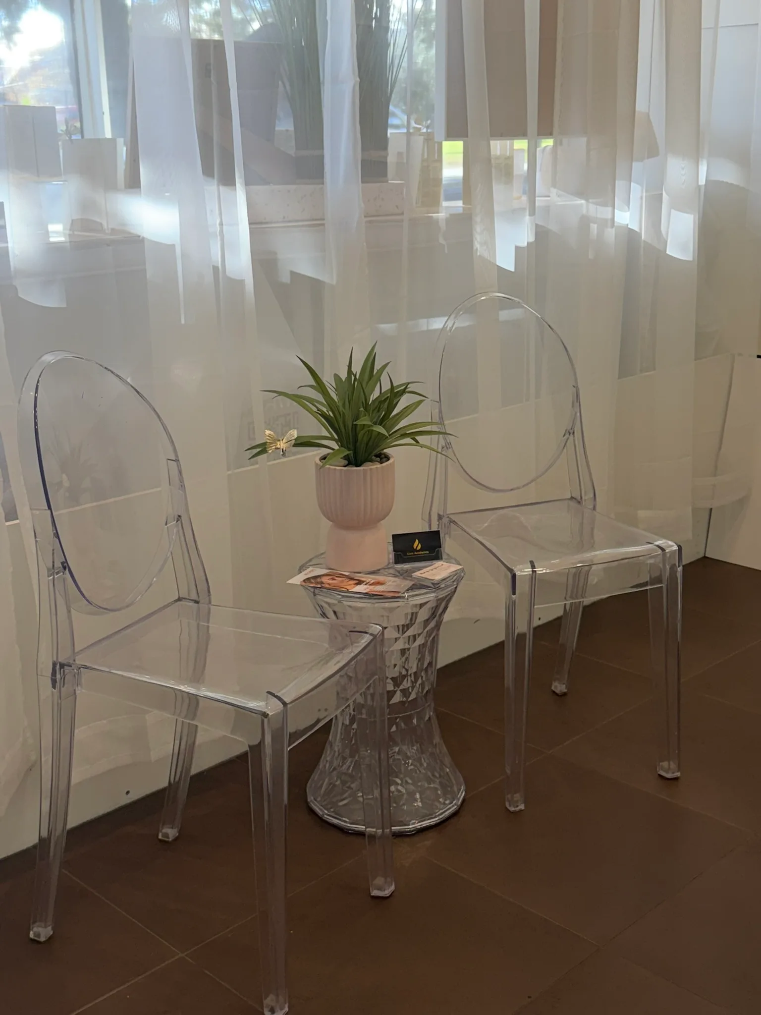 Clear acrylic chairs in the genuine Core Aesthetics waiting area at 12A Atherton Road Oakleigh
