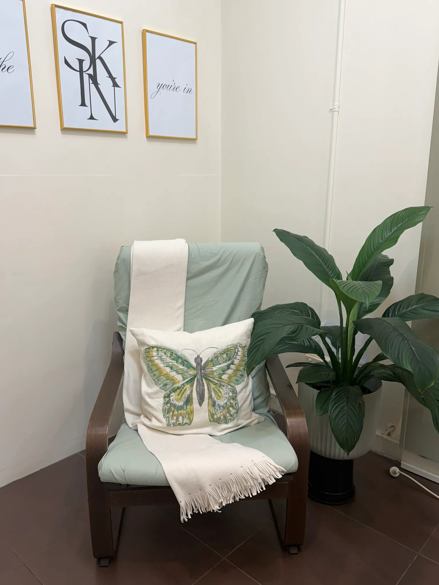 Waiting chair and plant inside Core Aesthetics in Oakleigh